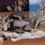 2cv-citroen-zwischen-bäumen-01