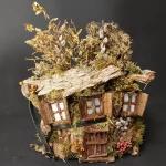 rundliches-haus-mit-vielen-fenstern